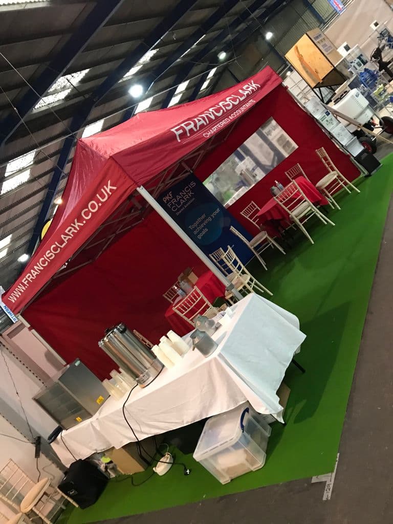 Francis Clark pop-up gazebo stand with furniture hire
